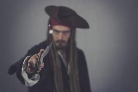 Pirate with Knife, costumed young man