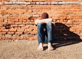 Person Young Sitting wall