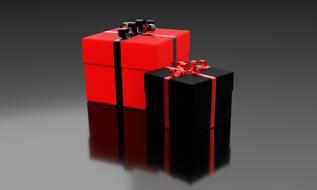 red and black christmas presents at grey background