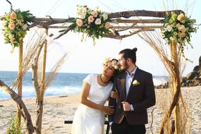 Wedding on Beach, happy Couple in arch