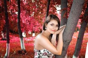 girl in Autumn Park red