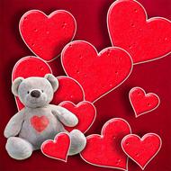 Valentineâs Day greeting, teddy bear and hearts