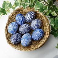 blue and white Sorbian Easter Eggs on weaved bowl