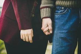 hands of a romantic couple