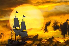 clipart of the sailboats at the yellow sunset