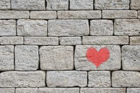heart drawn on the brick wall