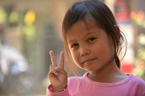 photo of asian girl in good mood