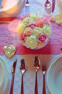 elegant bouquet of roses on a wedding table