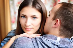 Man kissing his couple