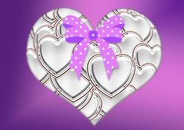 painted metal heart with polka dot bow