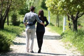 hugging romantic couple in the park