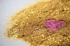 purple Heart on golden sand