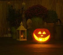 glowing pumpkin on the holiday table