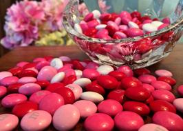 Valentines, pink and red Candies on table