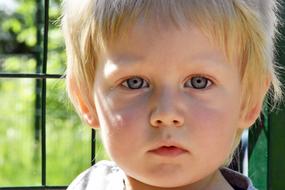 photo of a cute boy with white hair