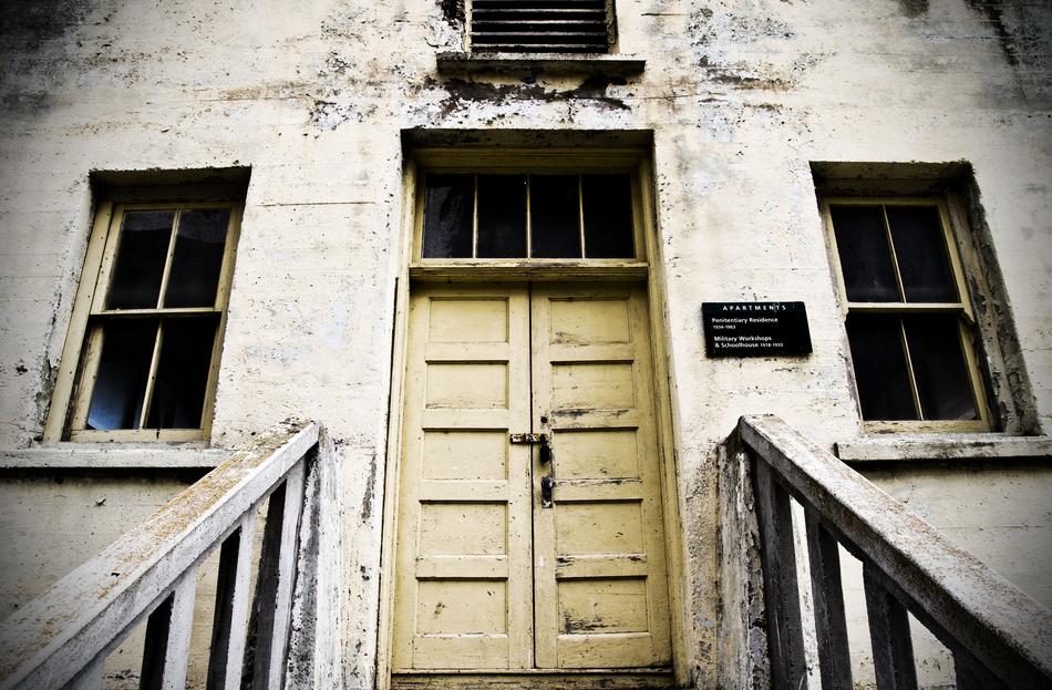 Old school house, with the darkness in the windows