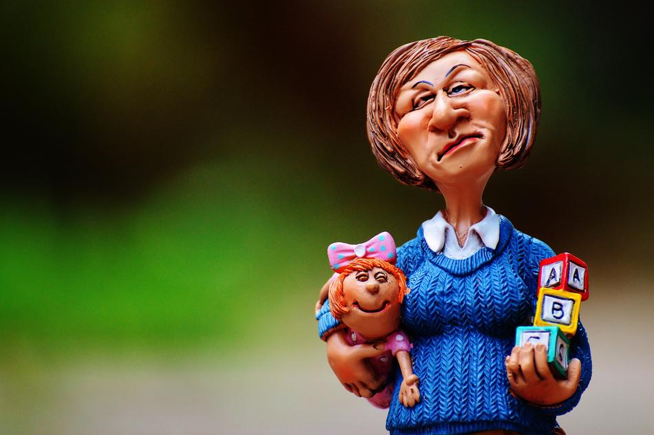 funny babysitter figurine on blurred background