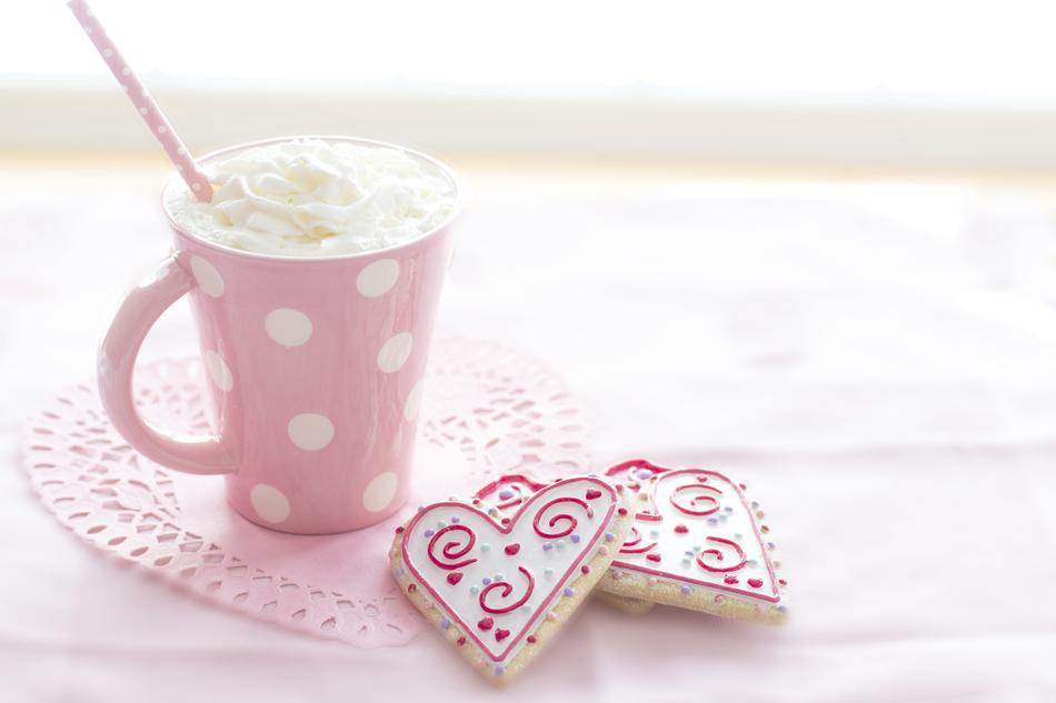 cream in pink mug and heart form cookies, Valentineâs Day