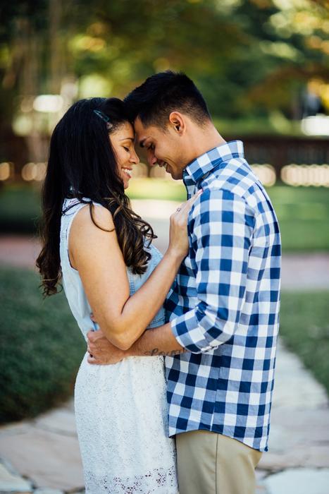 couple in love in park on blurred background