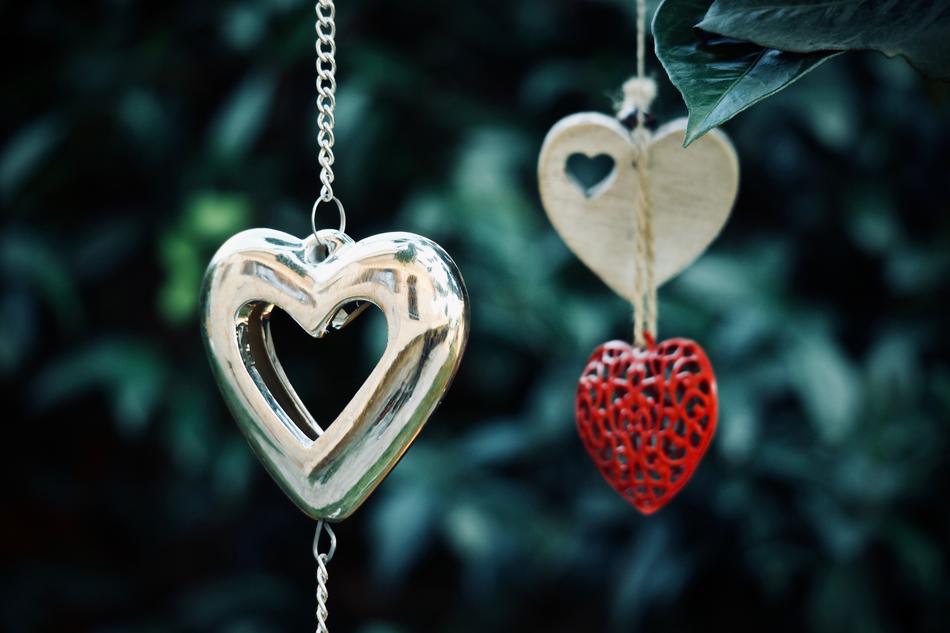 heart as an ornament on a chain on a blurred background