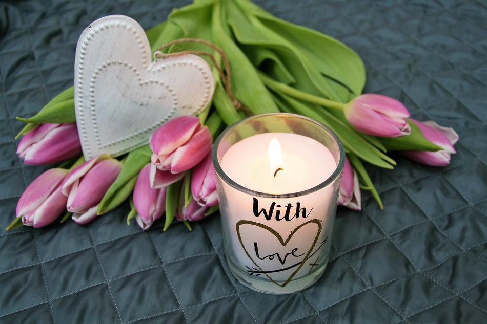 Beautiful tulip flowers and beautiful candle