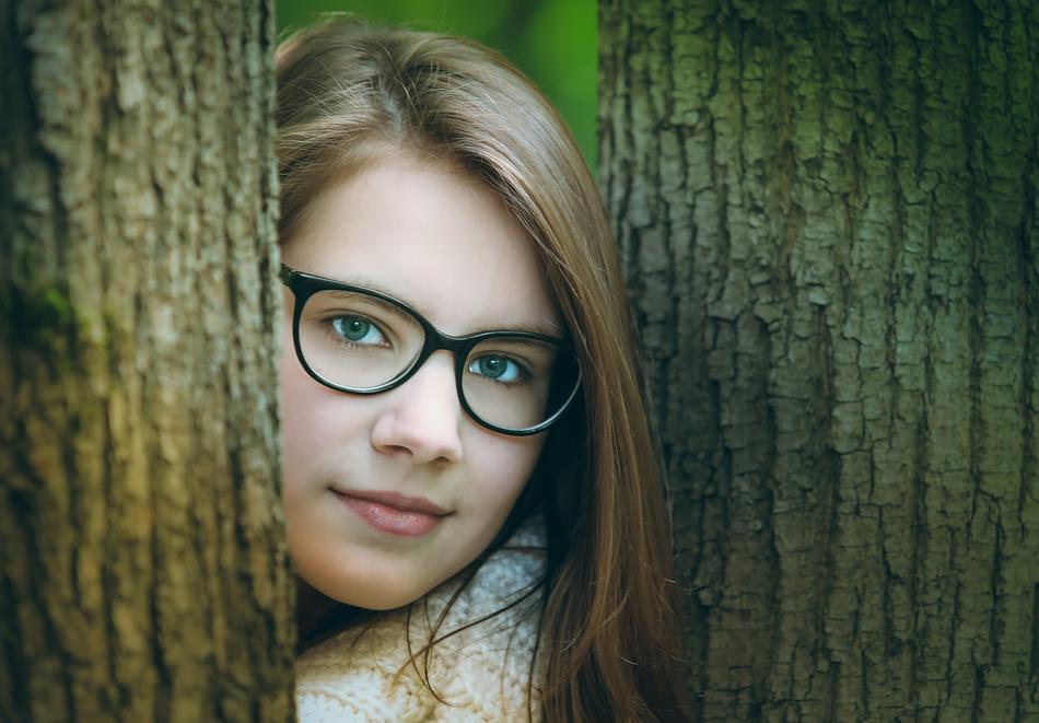 Portrait of Girl with Glasses in forest