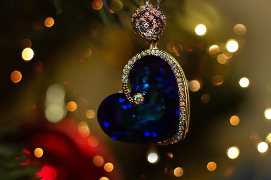 jewelry pendant on a background of Christmas lights