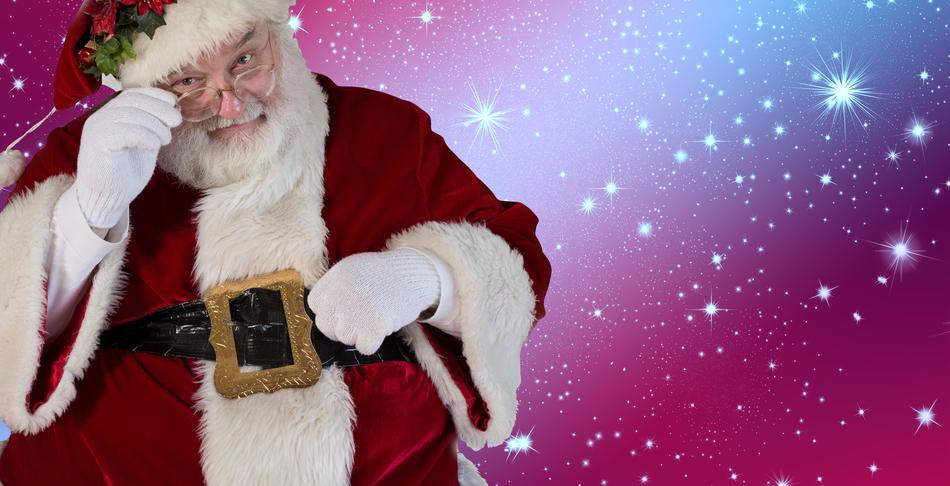 a man dressed as Santa Claus on a background of stars