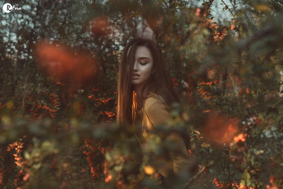 Pretty girl in forest on golden hour