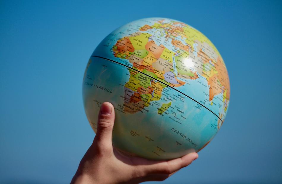 photo of globe in hand