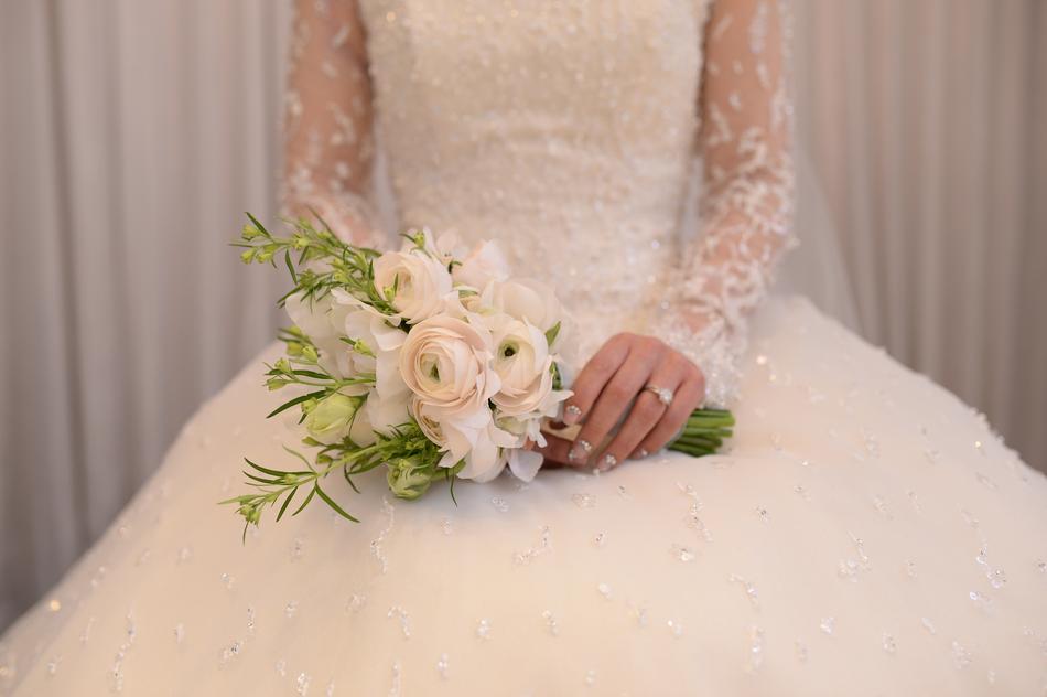 photo of the bride’s dress and bouquet