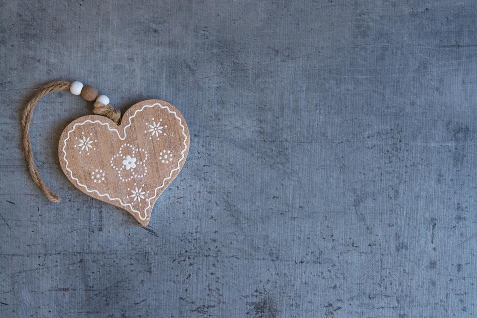Wooden Heart with floral pattern on grey background
