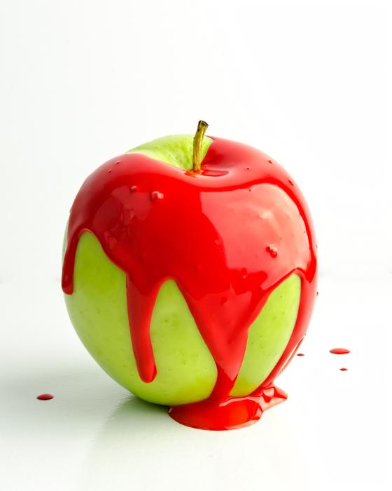 green Apple partly covered with red Red