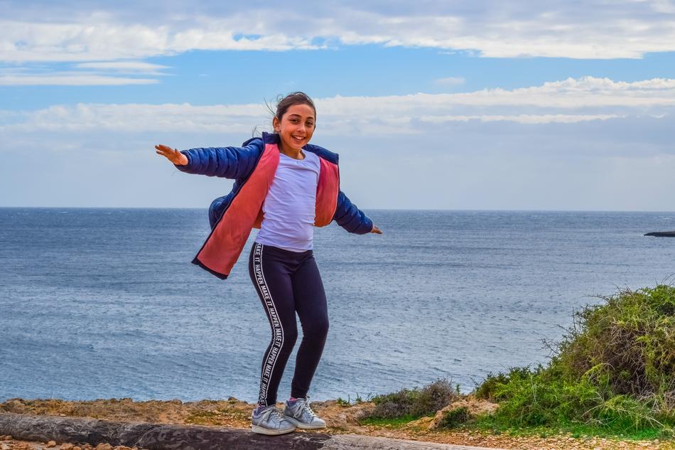 Girl Playing Child on beach