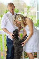 photo of happy family and beloved dog