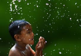 boy and water rain drops