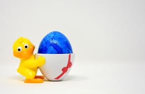 Easter Egg in Cup with Chicken figure
