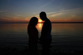 couple in love on the evening sea