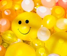 yellow balloons with smiley