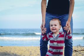 baby Son with Father on beach