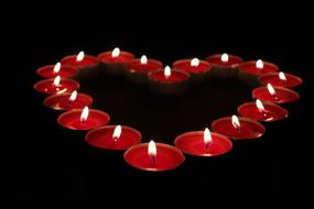 red Candles in Heart shape