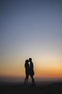 couple in love at dusk at sunset