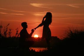 Couple in Love at Sunset, proposal marriage