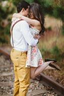 happy couple at a photo shoot on the rails