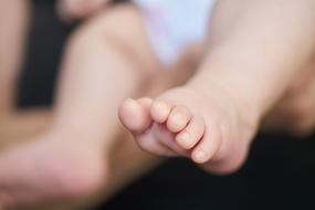 Close-up of the cute child feet