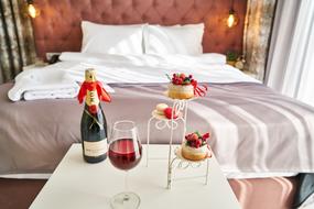 Wine and Fruits and Bed at hotel