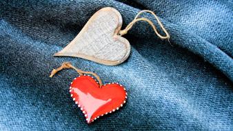 jewelry in the form of hearts on woolen fabric