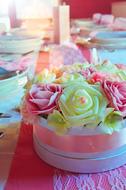 Beautiful and colorful wedding bouquet on the colorful table with decorations