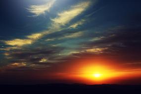 red sun at dark sky