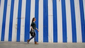 Women Walk City blue white wall, valencia